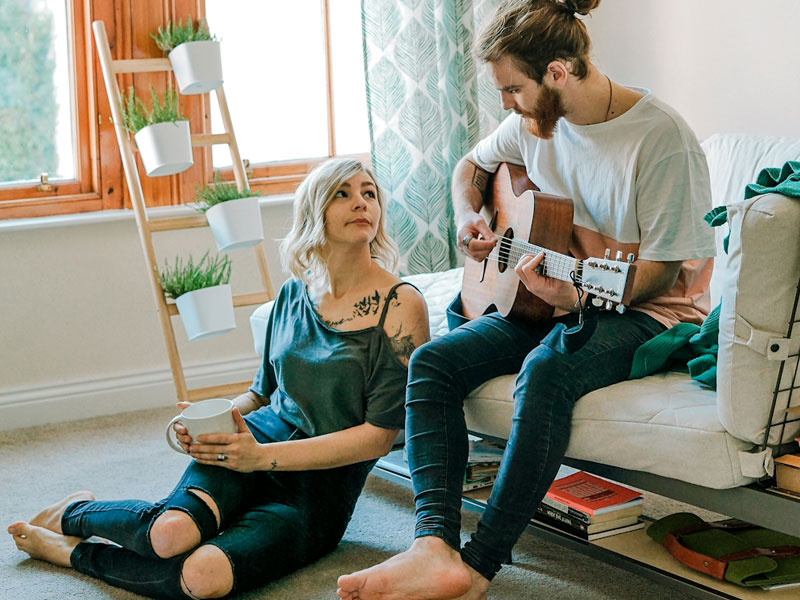an image of two people chilling and represents the comfort brought by a reliable zone cooling system