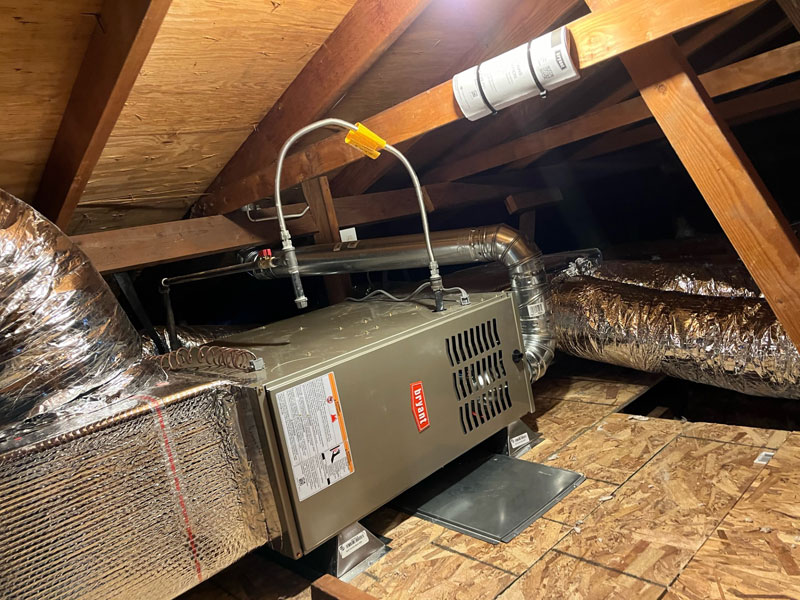 an image that shows a heating equipment and some air conditioning ducts. We can provide ductless air conditioning as well.